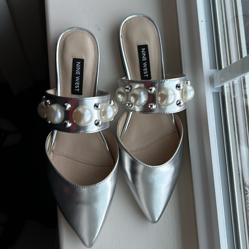 NWOT Flat shoes, 0.6 inch heels.